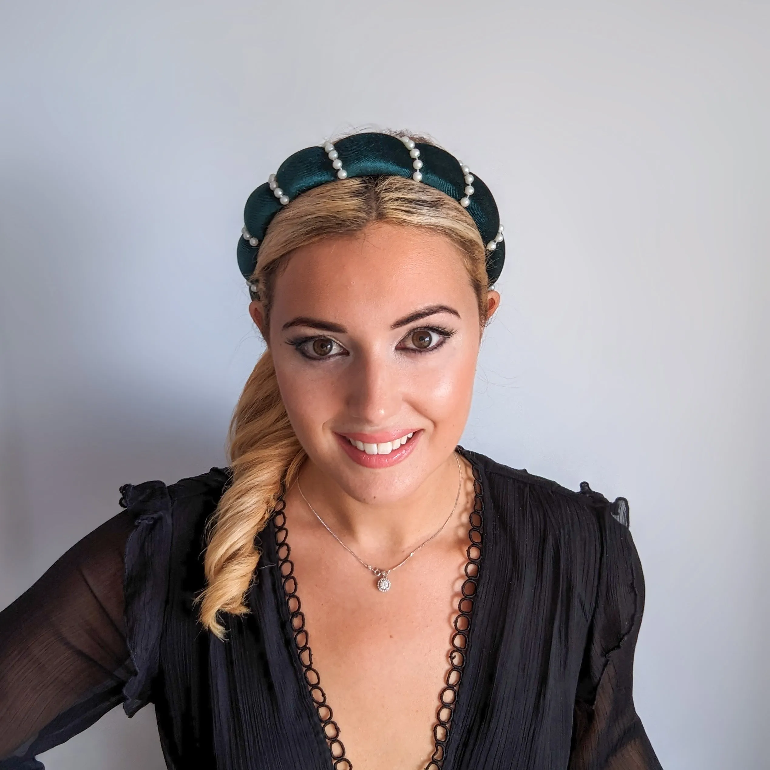 Bottle green pearl ruched padded velvet headband fascinator