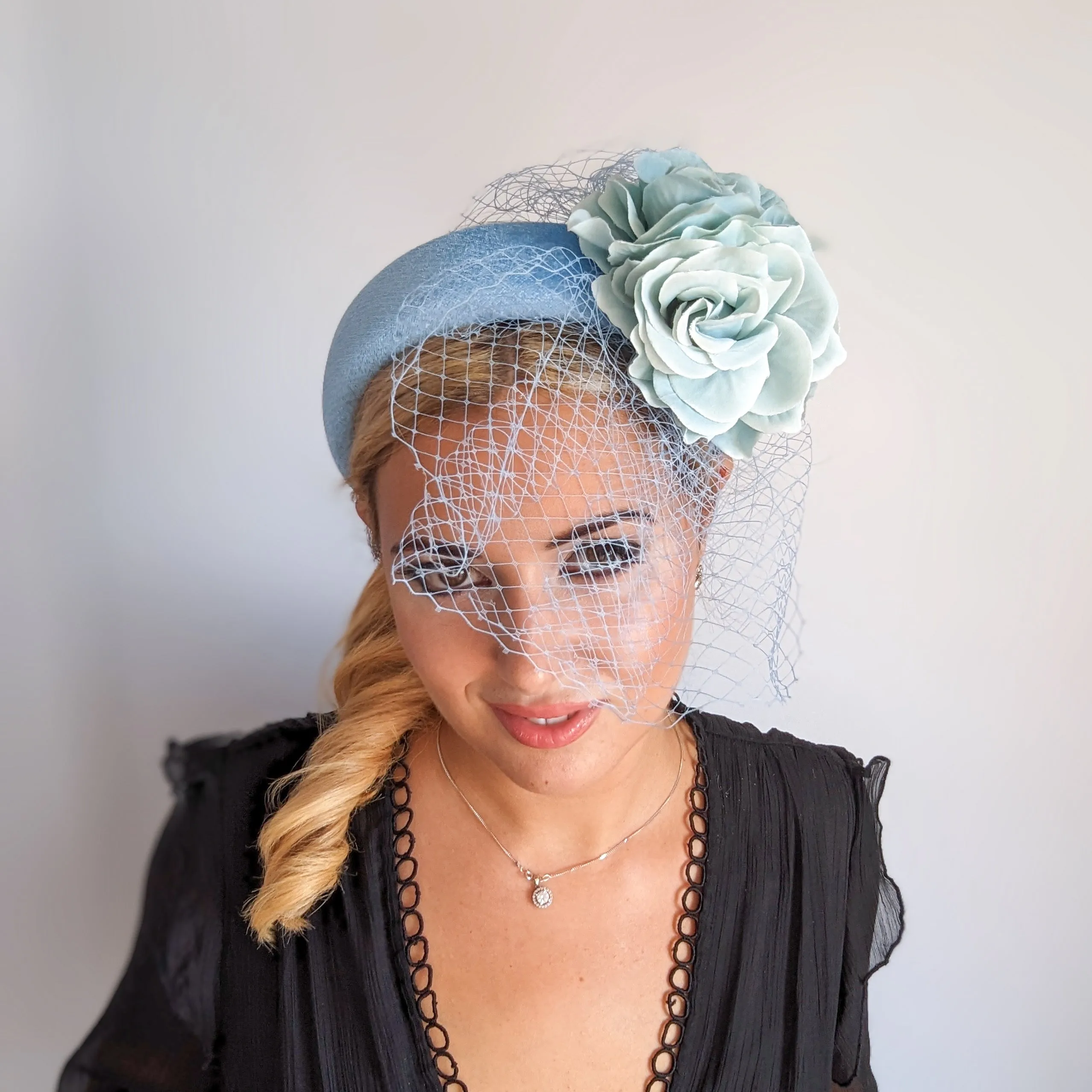 Light cornflower blue aquamarine flower padded velvet headband fascinator