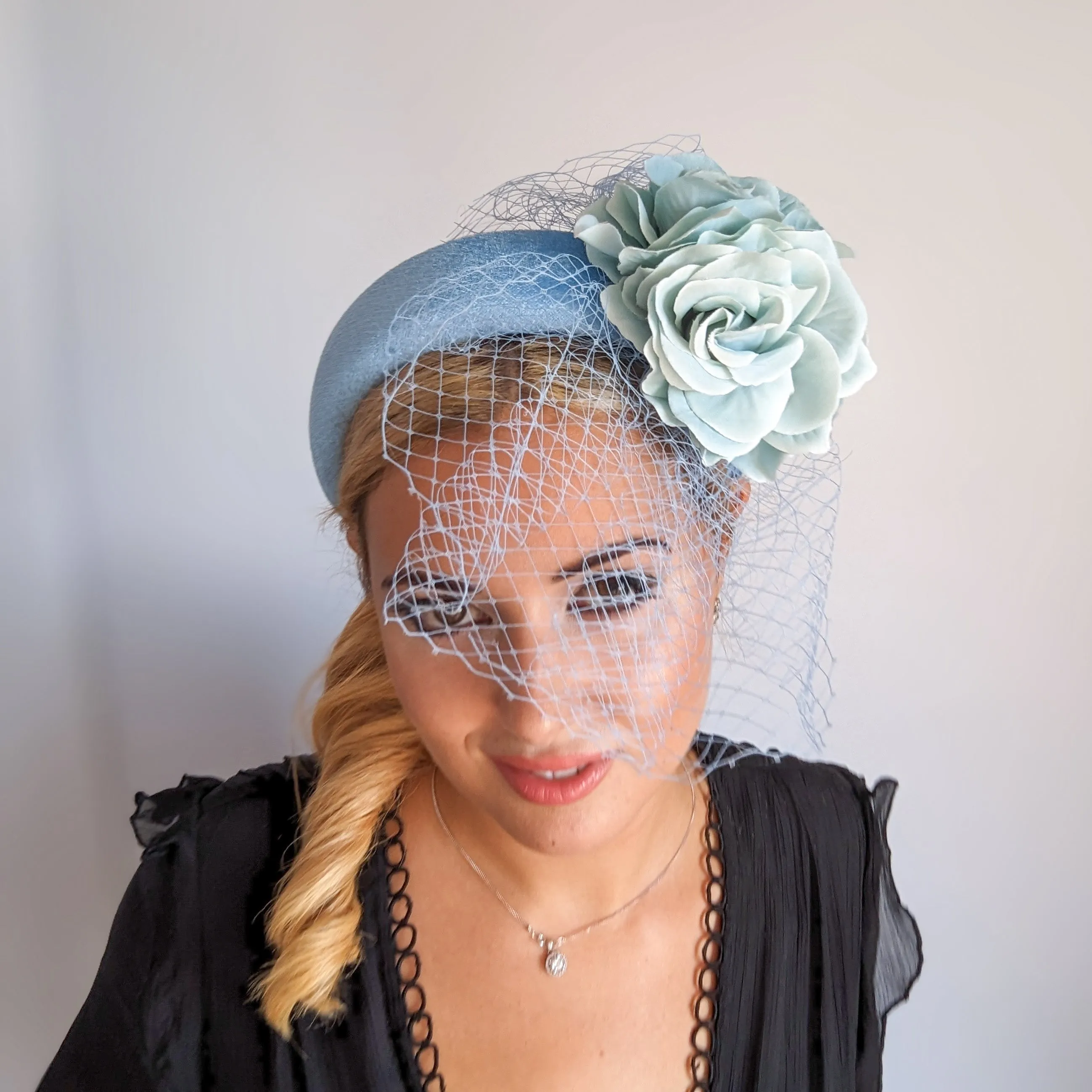 Light cornflower blue aquamarine flower padded velvet headband fascinator