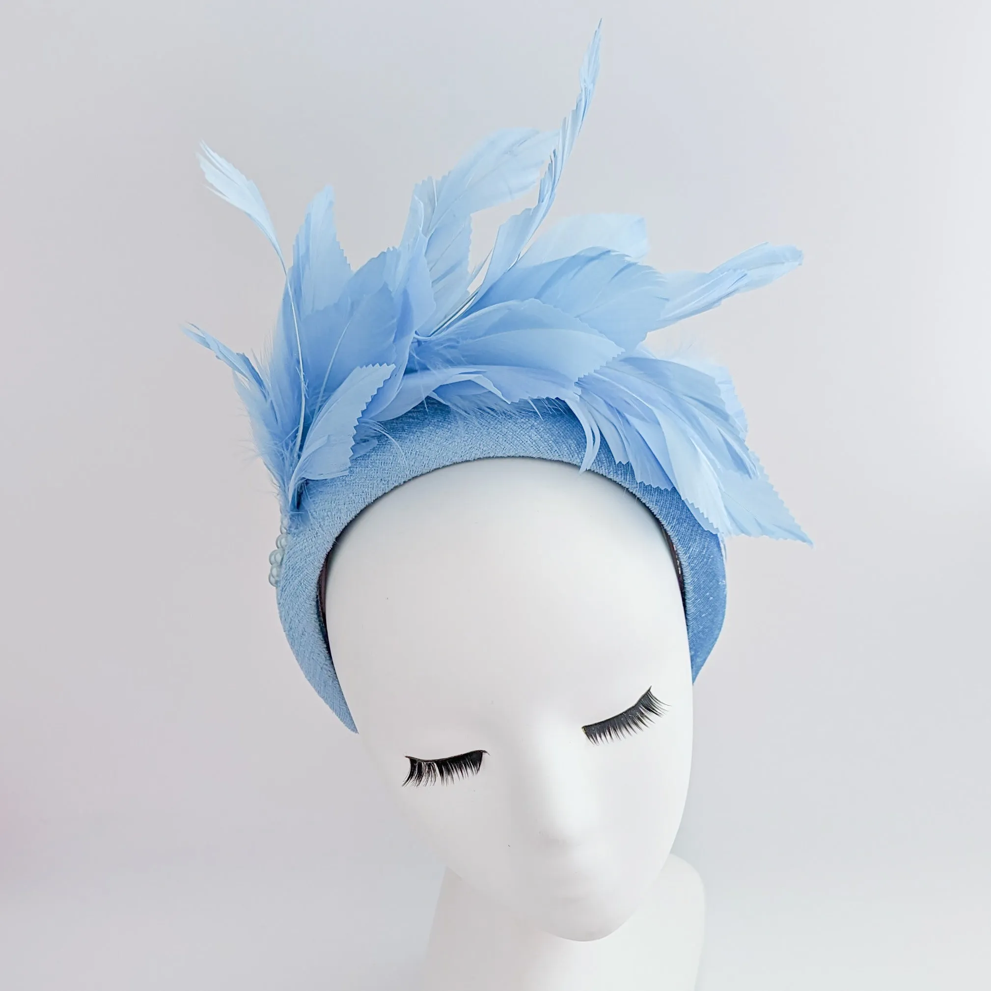 Light cornflower blue feather padded velvet headband fascinator