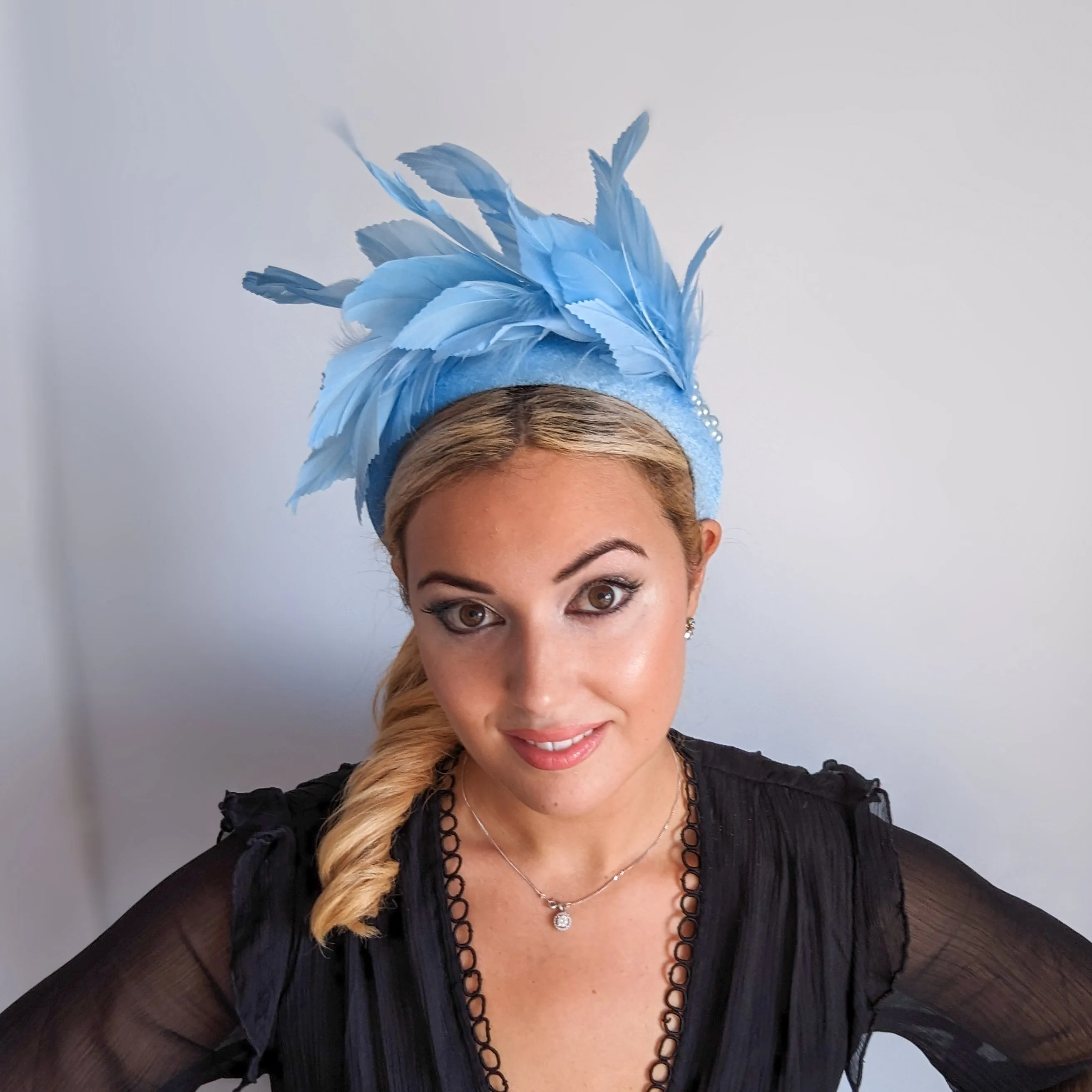 Light cornflower blue feather padded velvet headband fascinator