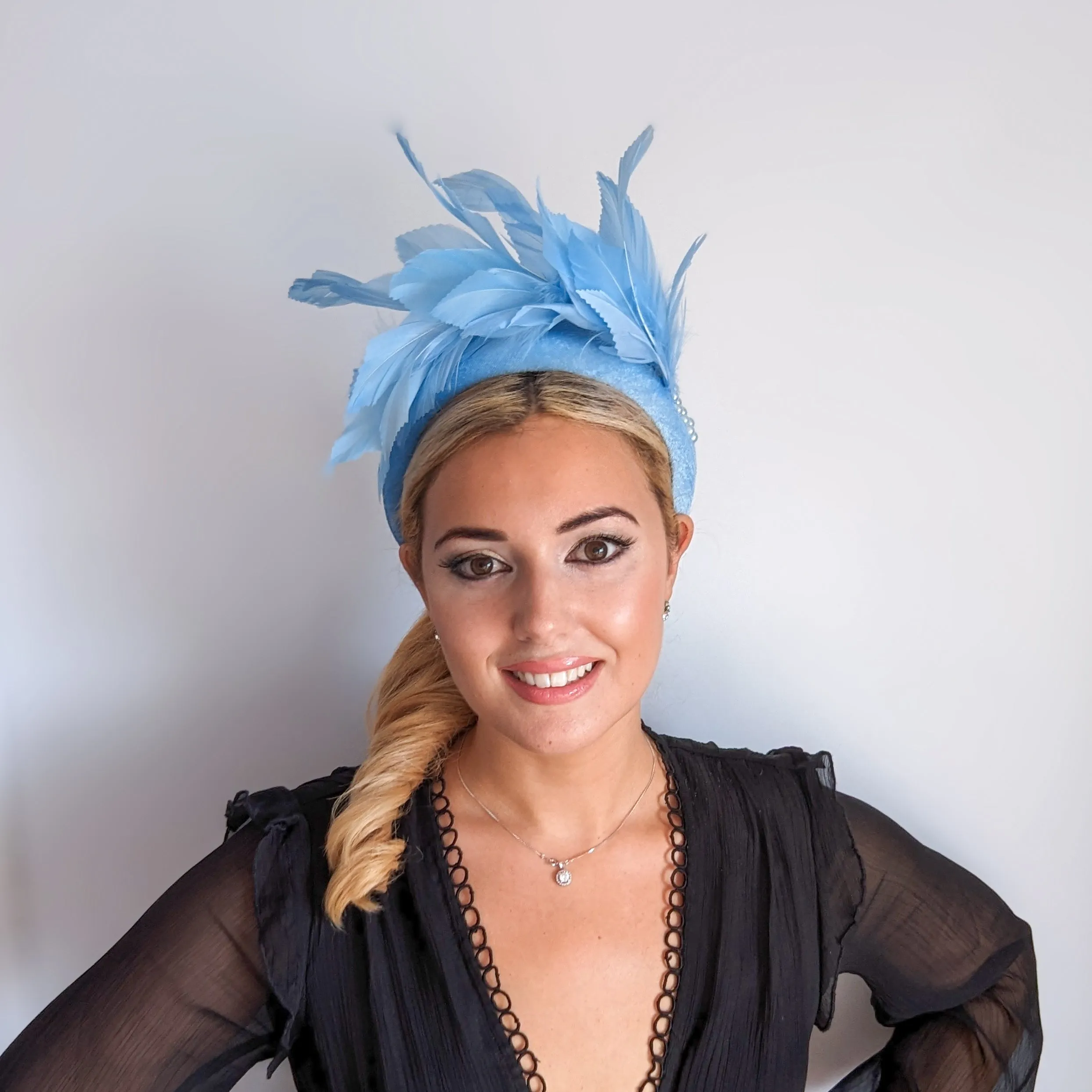 Light cornflower blue feather padded velvet headband fascinator