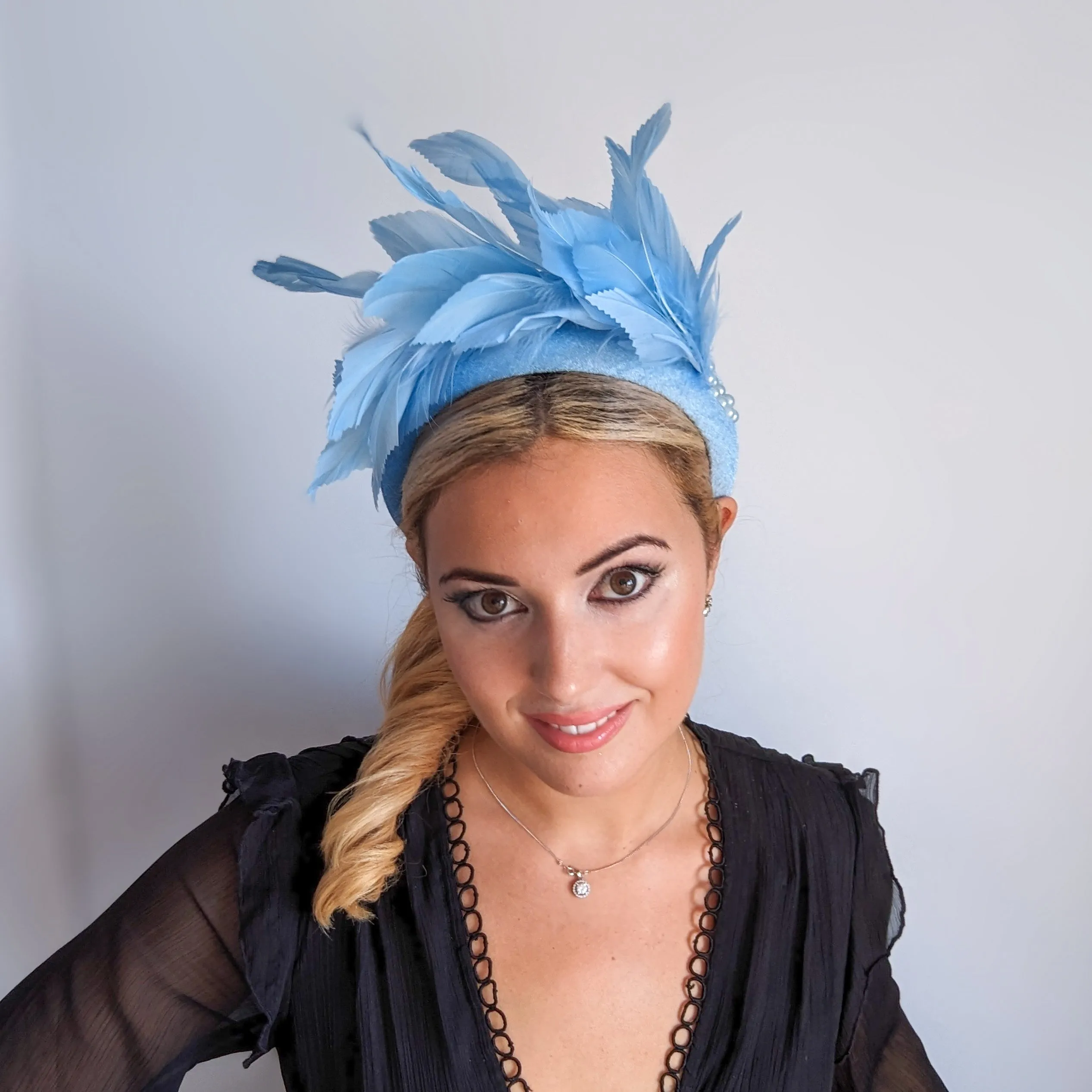 Light cornflower blue feather padded velvet headband fascinator