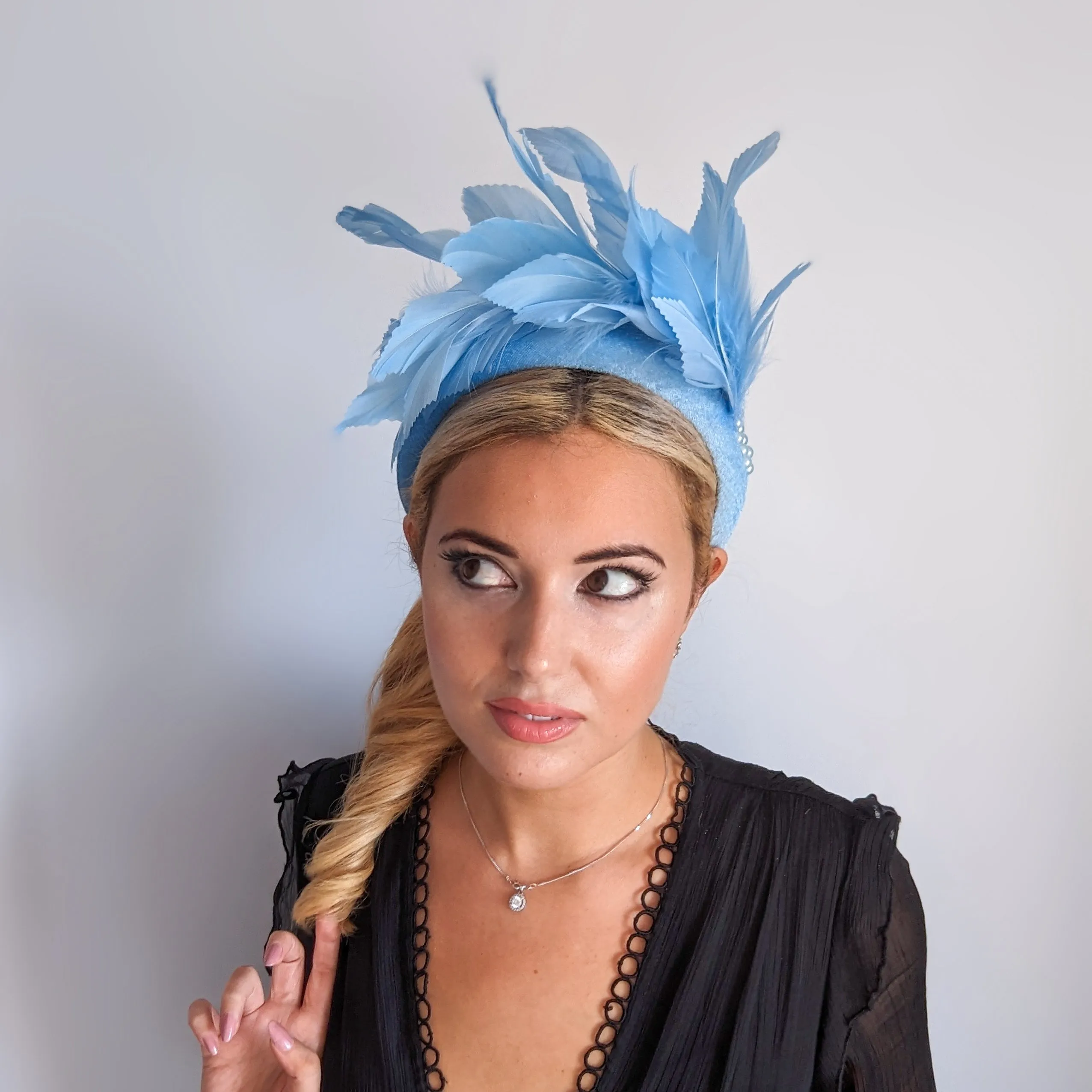Light cornflower blue feather padded velvet headband fascinator