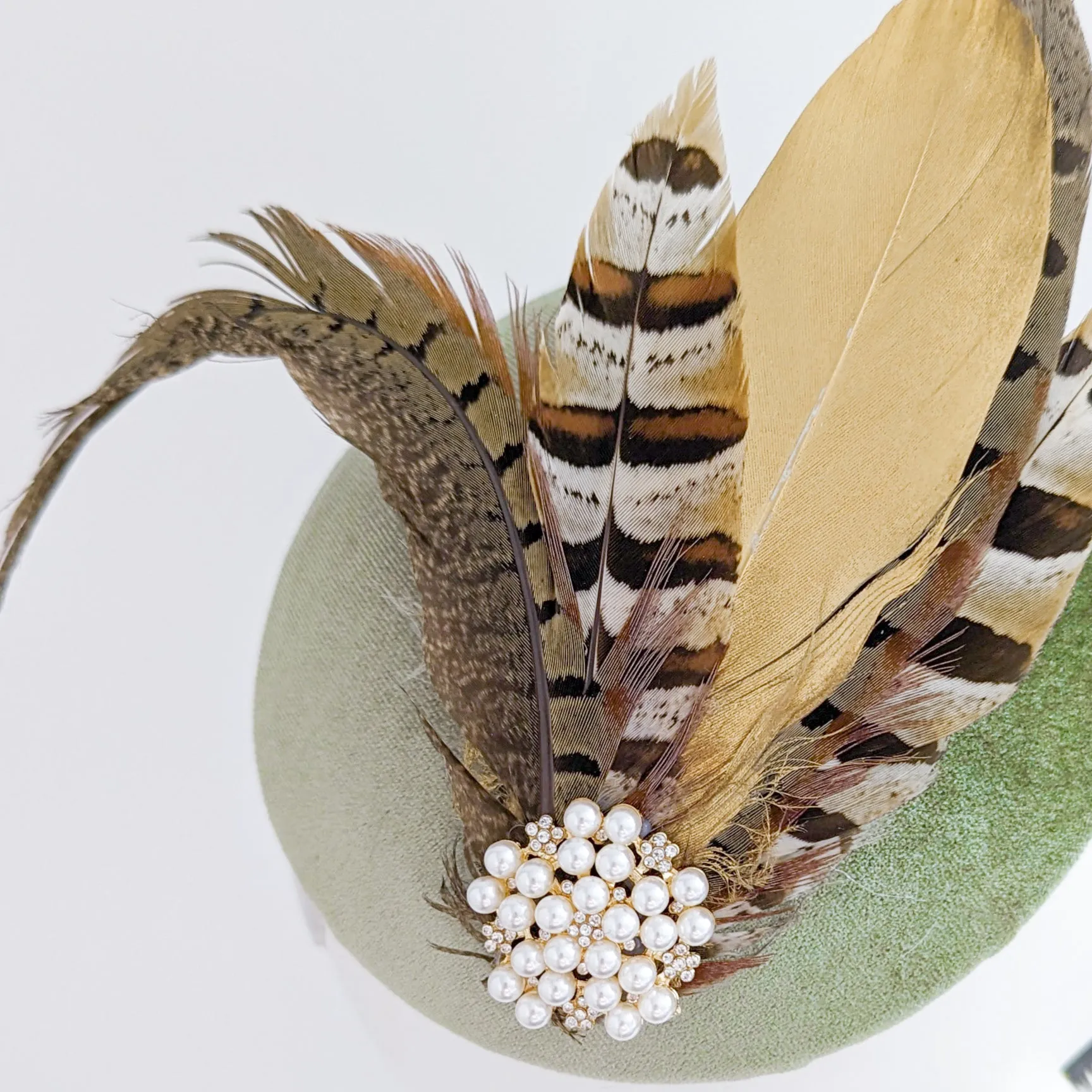 Sage green pheasant feather small velvet fascinator wedding hats uk